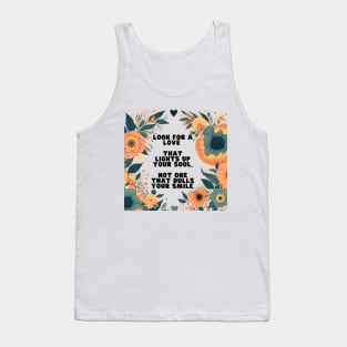 "Turn on your inner light: look for a love that illuminates the soul, not extinguishes your smile."💔➡️💖 Tank Top